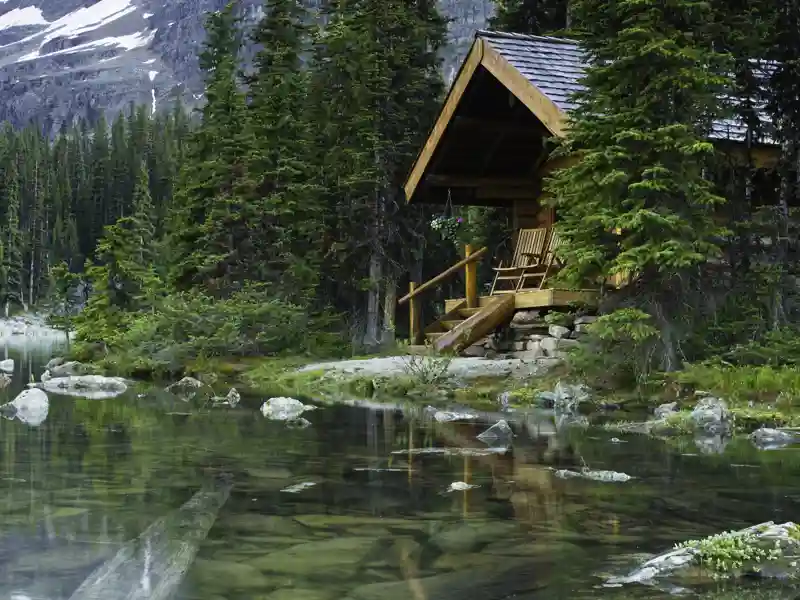 Rustic cabin on the lake in the forest.