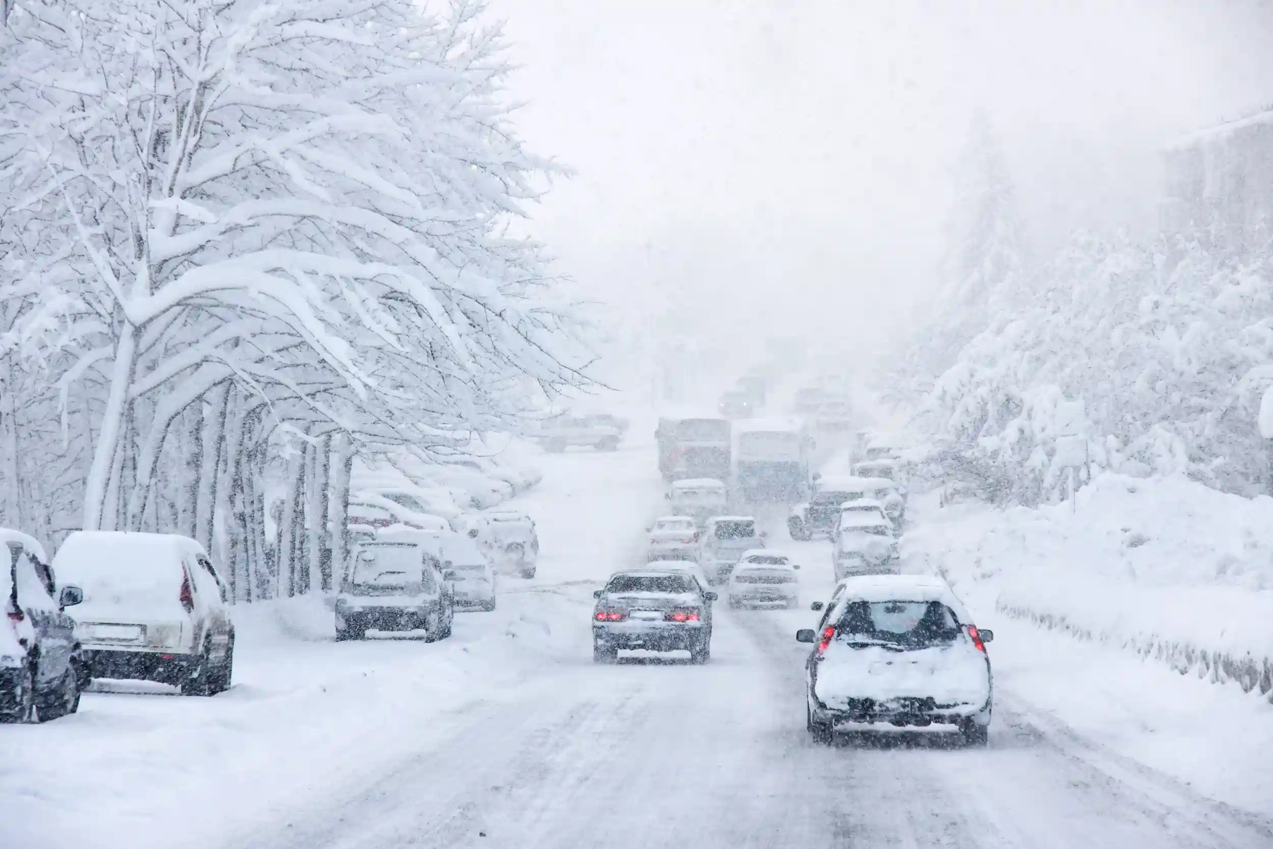 Snowstorm, poor visibility,slick roads and lots of traffic.