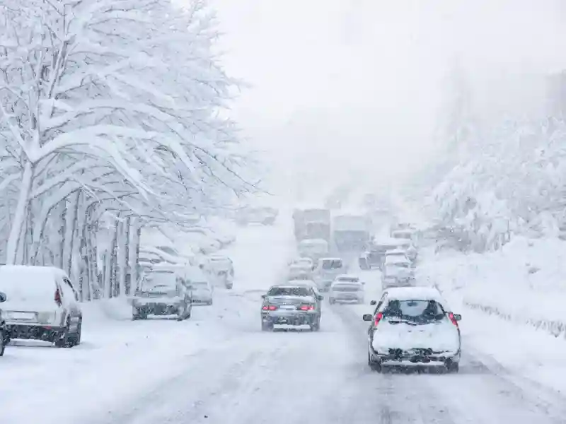 Snowstorm, poor visibility,slick roads and lots of traffic.