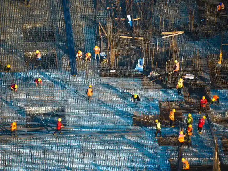 Arieal view of construction workers on a job site.