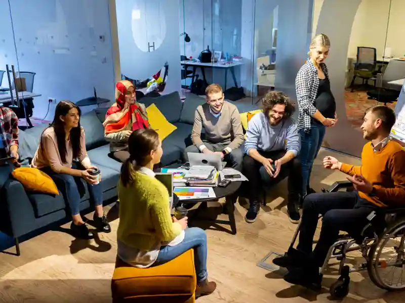 Group of co-workers in a casual meeting.