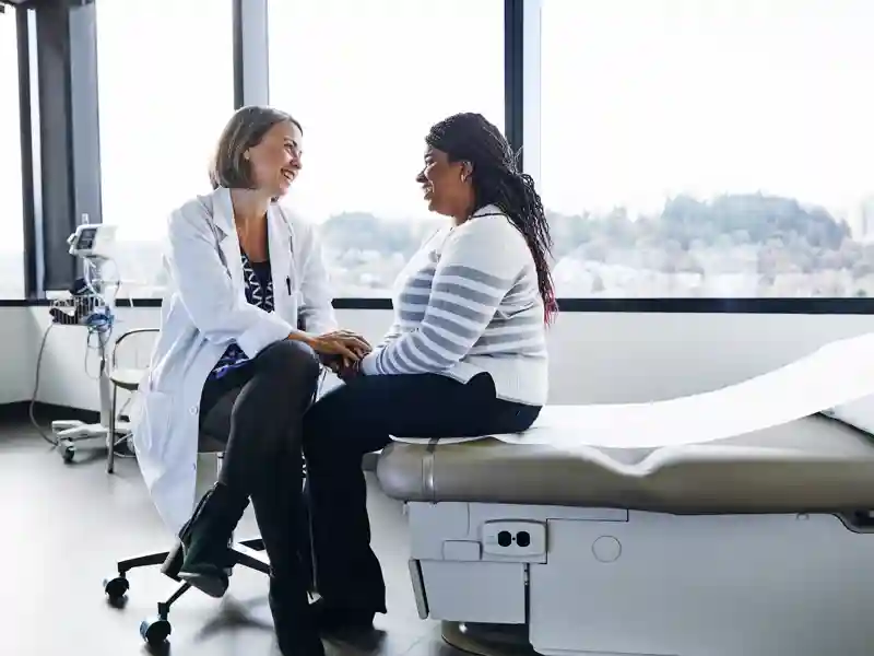 Woman talking with her doctor.